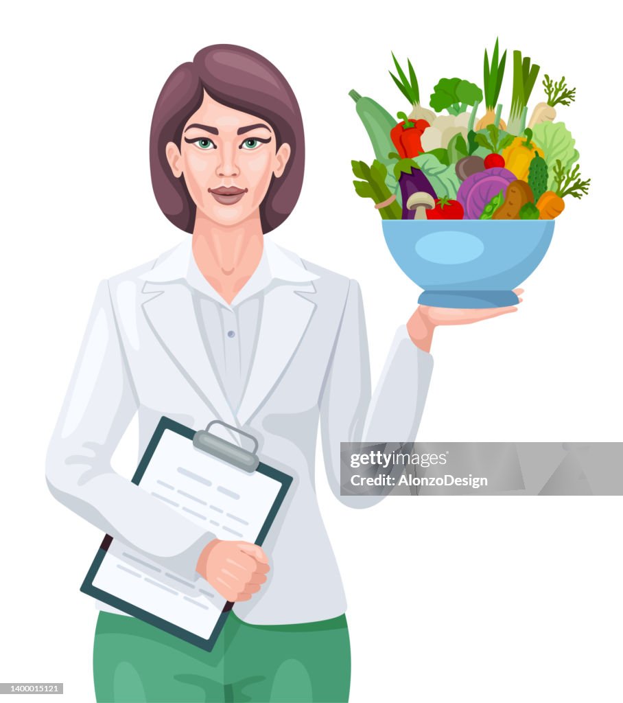 Nutritionist or dietician showing vegetables in a bowl.