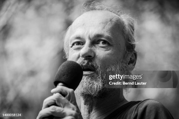 Image has been converted to black and white.) KERPEN-BUIR, GERMANY Activist Todde Kemmerich speaks prior to a forest walk to protest against the...