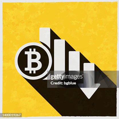 Bitcoin rate decrease. Icon with long shadow on textured yellow background Bitcoin rate decrease. Icon with long shadow on textured yellow background