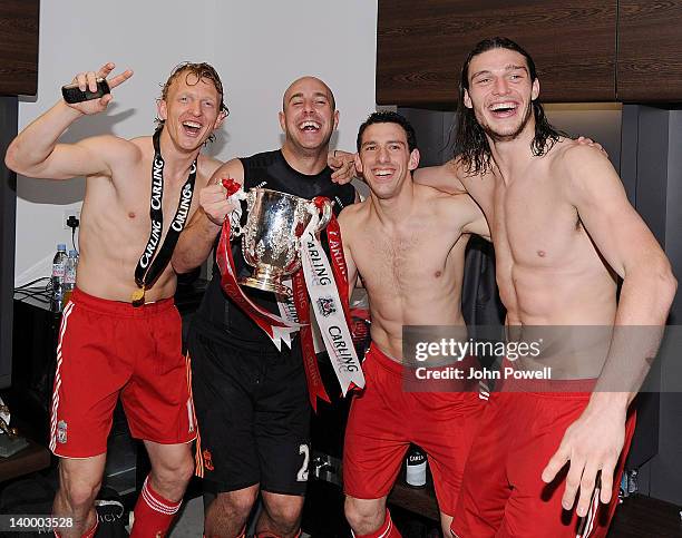 Dirk Kuyt, Pepe Reina, Maxi Rodriguez and Andy Carroll of Liverpool celebrate with the cup after the Carling Cup Final match between Liverpool and...