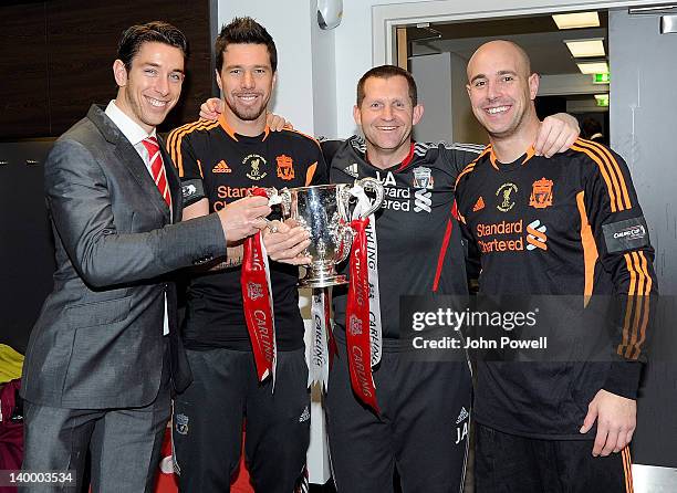 Brad Jones, Alexander Doni, First Team Goalkeeping coach John Achterberg and Pepe Reina of Liverpool celebrate with the cup in the dressing room...