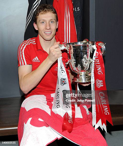 Lucas Leiva of Liverpool celebrates with the cup in the dressing room after the Carling Cup Final match between Liverpool and Cardiff City at Wembley...