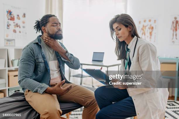 problems with my throat - lymph node stock pictures, royalty-free photos & images