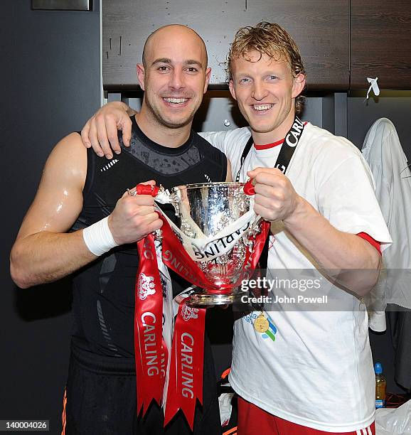 Pepe Reina and Dirk Kuyt of Liverpool celebrate with the cup in the changing room after the Carling Cup Final match between Liverpool and Cardiff...