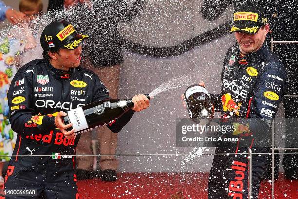 Race winner Sergio Perez of Mexico and Oracle Red Bull Racing and Third placed Max Verstappen of the Netherlands and Oracle Red Bull Racing celebrate...