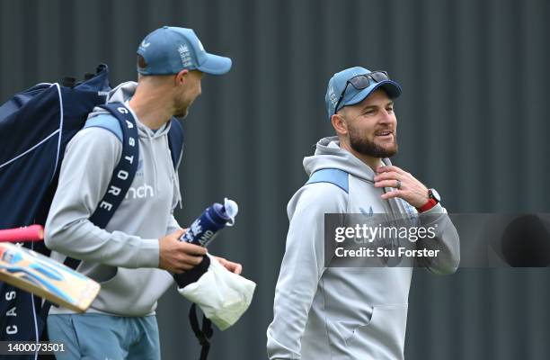 England batsman Joe Root speaks with new head coach Brendon McCullum during an England nets session ahead of the test series against New Zealand at...