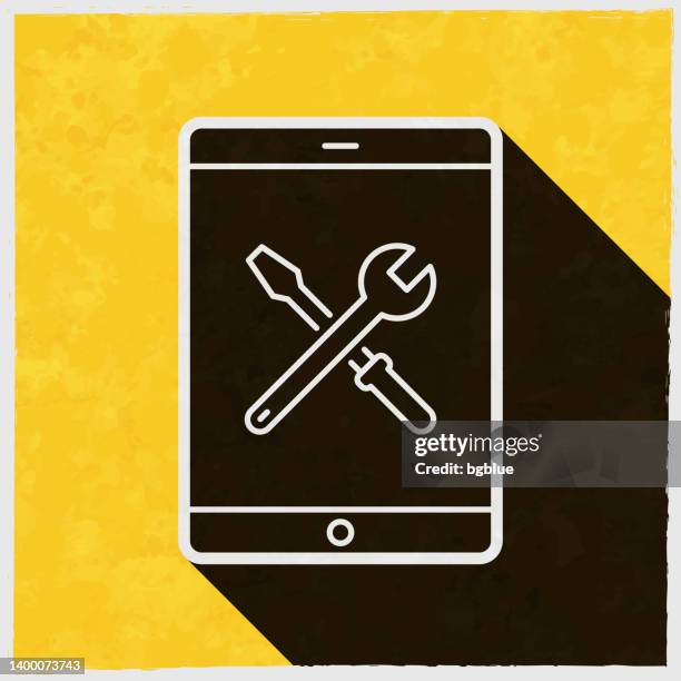 tablet pc settings - tools. icon with long shadow on textured yellow background - using tablet home stock illustrations