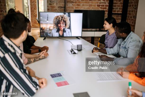 hybrid office meeting - sales pitch stock pictures, royalty-free photos & images