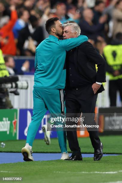 Davide Ancelotti Assistant coach of Real Madrid kisses his father Carlo Ancelotti Head coach of Real Madrid on the head after Vinicius Junior of Real...