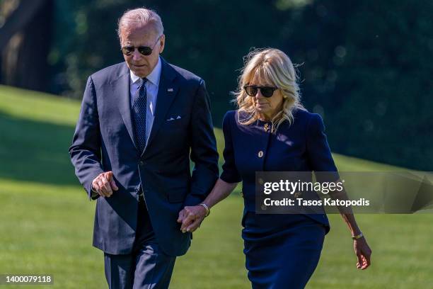 President Joe Biden and first lady Jill Biden walk on the south lawn of the White House on May 30, 2022 in Washington, DC. The Bidens spent the...