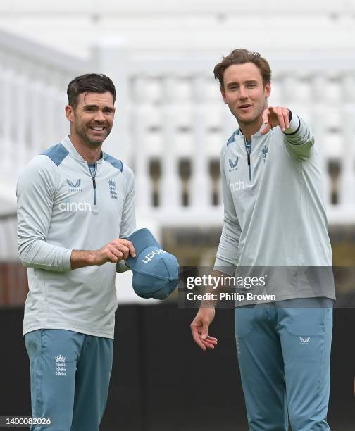 James Anderson and Stuart Broad of England look on during a training session before Thursday's first Test match against New Zealand at Lord's Cricket...