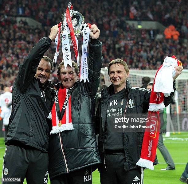Steve Clarke, Kenny Dalglish and Kevin Keen of Liverpool celebrate with the trophy at the end of the Carling Cup Final match between Liverpool and...