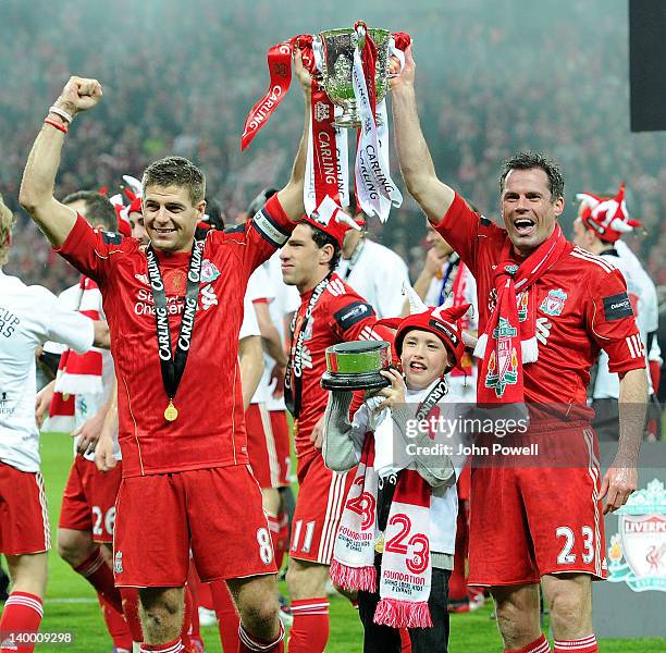 Steven Gerrard and Jamie Carragher of Liverpool celebrate with the cup after the Carling Cup Final match between Liverpool and Cardiff City at...