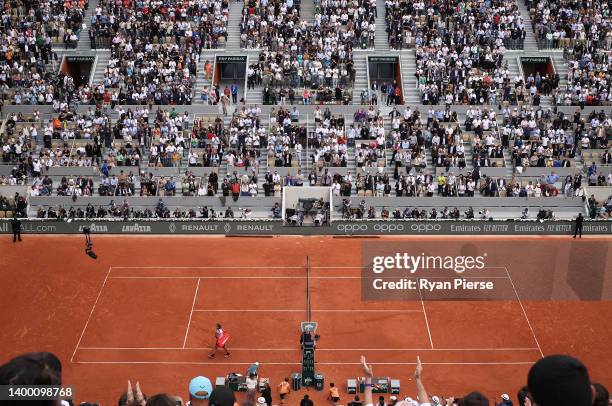 Stefanos Tsitsipas of Greece walks off court after losing against Holger Rune of Denmark during the Men's Singles Fourth Round match on Day 9 of The...