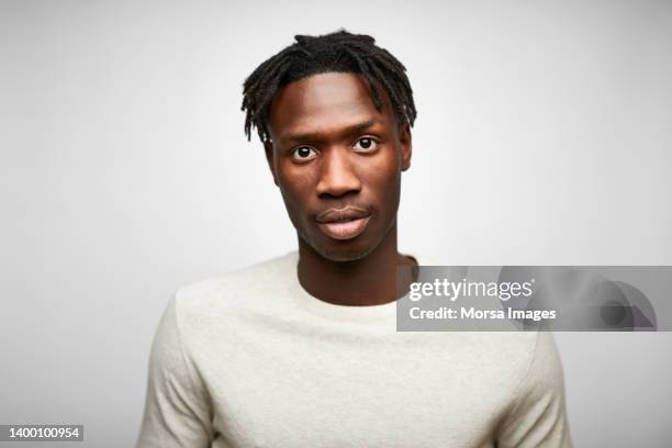 close-up of businessman with afro hairstyle - african man imagens e fotografias de stock