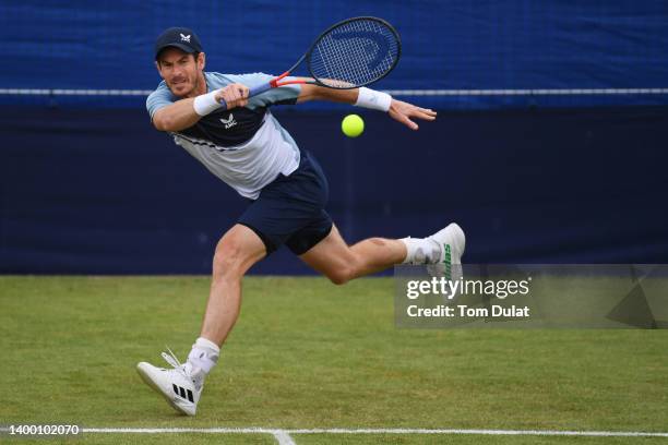 Andy Murray of Great Britain plays a forehand against Jurij Rodionov of Austria during the Men's Singles First Round match on day 2 of the Surbiton...