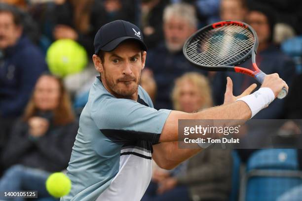 Andy Murray of Great Britain plays a backhand against Jurij Rodionov of Austria during the Men's Singles First Round match on day 2 of the Surbiton...
