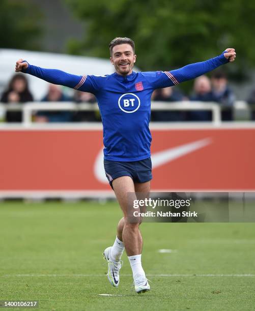 Jack Grealish celebrates during a England Men Training Session at St Georges Park on May 30, 2022 in Burton-upon-Trent, England.