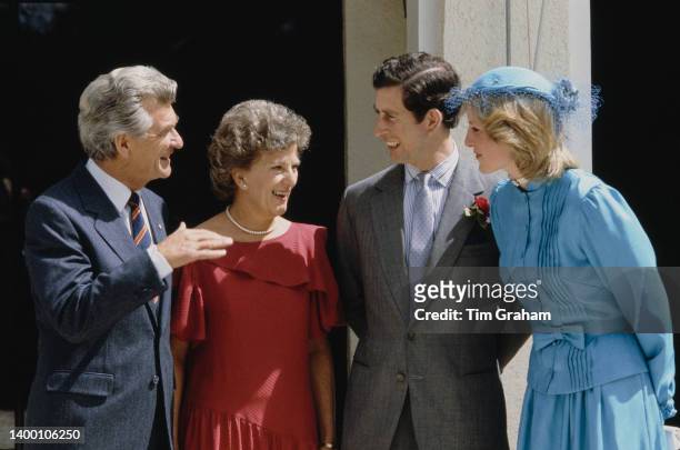Prince Charles and Princess Diana - wearing a Catherine Walker suit and a hat by John Boyd, with Australian Prime Minister Robert Hawke and Mrs Hawke...