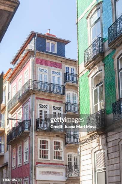 buildings, with colorful tiled facades, in porto. portugal - portugal tiles stockfoto's en -beelden