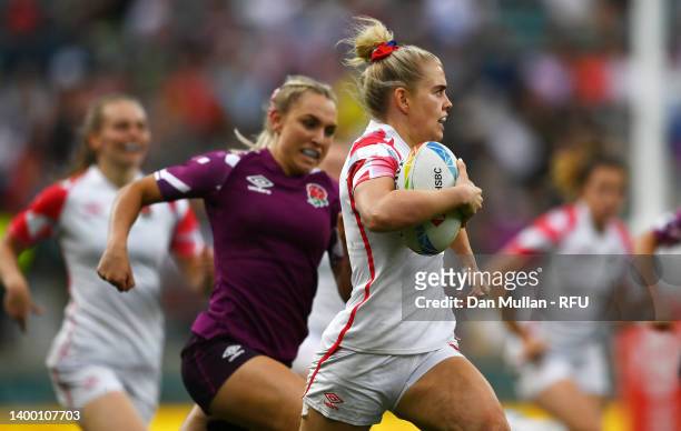 Grace Crompton of England makes a break to score a try during the Women's Inter-Squad match on day two of the HSBC London Sevens at Twickenham...