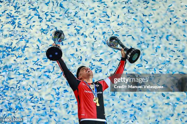 Aldo Rocha of Atlas celebrates with the trophy after winning the final second leg match between Pachuca and Atlas as part of the Torneo Grita Mexico...