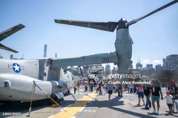 People visit an Osprey at the USS Bataan on Memorial Day on May 30, 2022 in New York City. The USS Bataan along with multiple other vessels...