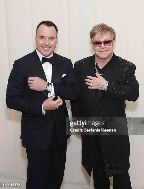 Musician Elton John and David Furnish attend Chopard at 20th Annual Elton John AIDS Foundation Academy Awards Viewing Party at The City of West...