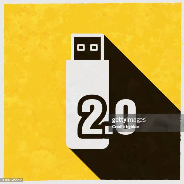 usb 2.0 flash drive. icon with long shadow on textured yellow background - memory card stock illustrations