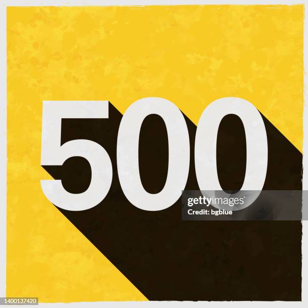 500 - five hundred. icon with long shadow on textured yellow background - number 500 stock illustrations