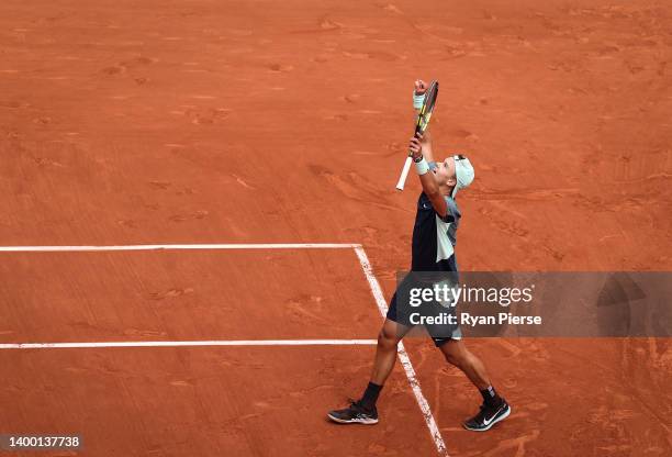 Holger Rune of Denmark celebrates after winning match point against Stefanos Tsitsipas of Greece during the Men's Singles Fourth Round match on Day 9...