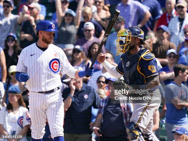 Omar Narvaez of the Milwaukee Brewers pumps his fist after the final out by P.J. Higgins of the Chicago Cubs during the ninth inning of Game One of a...