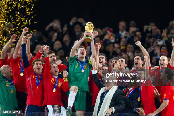 Iker Casillas Captain of Spain celebrates with the trophy after being handed it by Sepp Blatter, FIFA President and Jacob Zuma President of South...