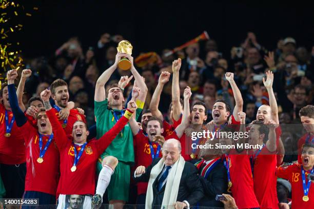 Iker Casillas Captain of Spain celebrates with the trophy after being handed it by Sepp Blatter, FIFA President and Jacob Zuma President of South...