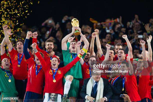 Iker Casillas Captain of Spain celebrates with the trophy after being handed it by Sepp Blatter, FIFA President and Jacob Zuma President of South...