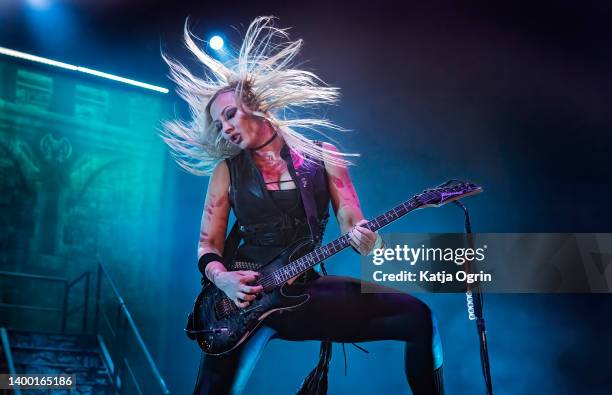 Guitarist Nita Strauss performs with Alice Coopers on stage at Resorts World Arena on May 30, 2022 in Birmingham, England.