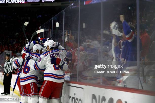 Chris Kreider of the New York Rangers celebrates with his team following a first period goal in Game Seven of the Second Round of the 2022 Stanley...