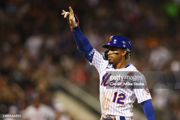Francisco Lindor of the New York Mets reacts after hitting a RBI single in the third inning against the Washington Nationals at Citi Field on May 30,...