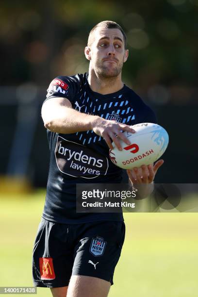 Isaah Yeo passes during a New South Wales Blues State of Origin squad training session at Coogee Oval on May 31, 2022 in Sydney, Australia.