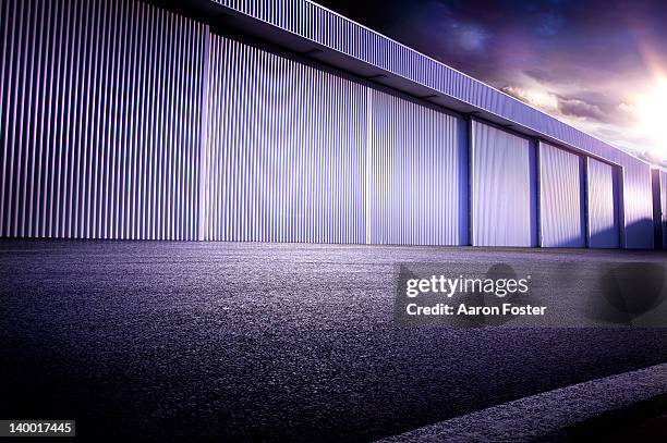 empty hangar. - hanger stock pictures, royalty-free photos & images