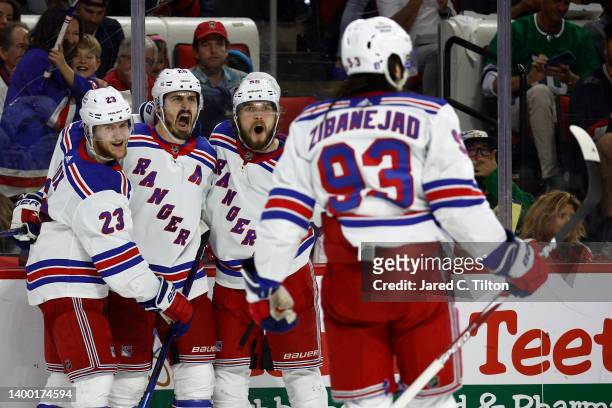 Chris Kreider of the New York Rangers reacts with his teammates following a third period goal in Game Seven of the Second Round of the 2022 Stanley...