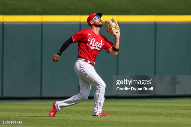 Albert Almora Jr. #3 of the Cincinnati Reds catches a fly ball in the fifth inning against the San Francisco Giants at Great American Ball Park on...
