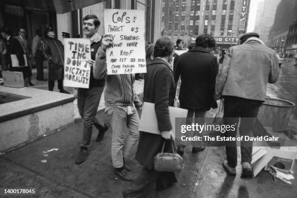 Following the Stonewall riots in the Summer of 1969, the Gay Liberation Front organizes and marches in New York City at the Time, Inc. Headquarters...