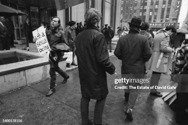 Following the Stonewall riots in the Summer of 1969, the Gay Liberation Front organizes and marches in New York City at the Time, Inc. Headquarters...