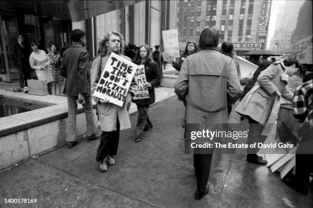 Following the Stonewall riots in the Summer of 1969, the Gay Liberation Front organizes and marches in New York City at the Time, Inc. Headquarters...