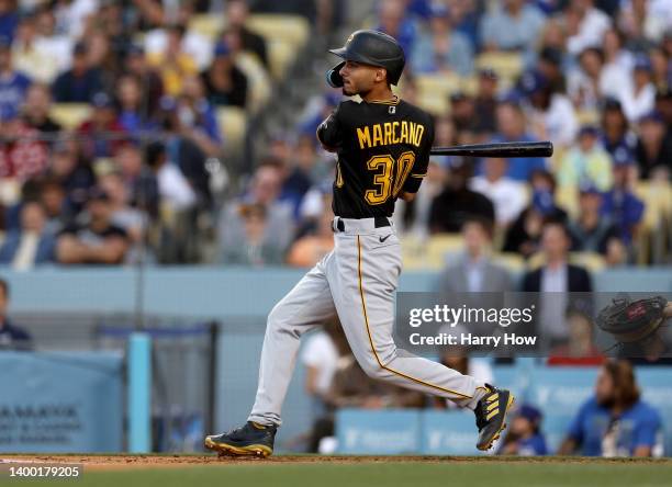 Tucupita Marcano of the Pittsburgh Pirates hits a three run homerun, to take a 3-0 lead over the Los Angeles Dodgers, during the second inning at...