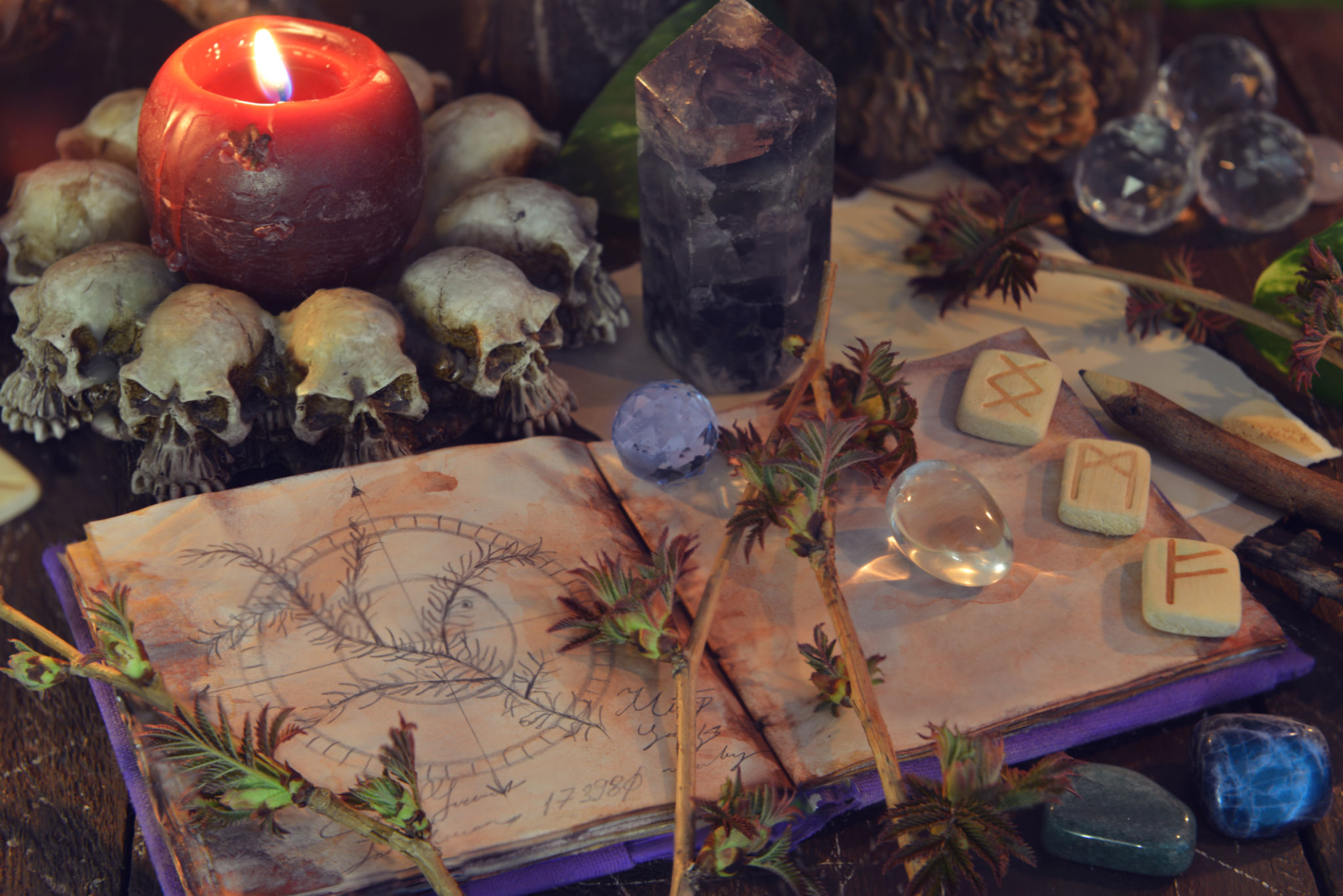 Wicca, esoteric and occult still life with vintage magic objects and open book on witch table altar for mystic rituals and fortune telling. Halloween and gothic concept Wicca, esoteric and occult still life with vintage magic objects and open book on witch table altar for mystic rituals and fortune telling. Halloween and gothic concept