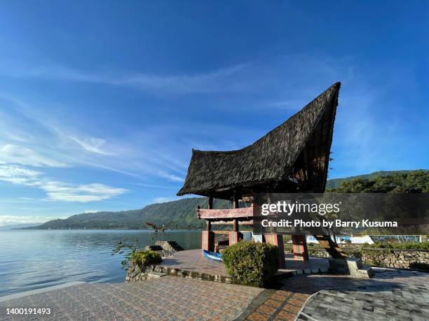 the traditional house where the batak toba. - lake toba sumatra stock pictures, royalty-free photos & images