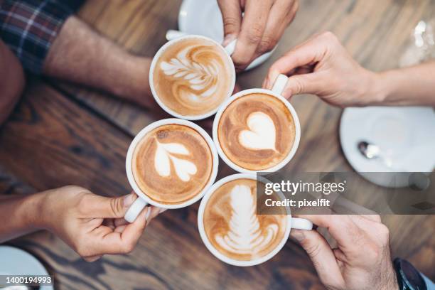 cappuccino art - enjoying coffee stock pictures, royalty-free photos & images