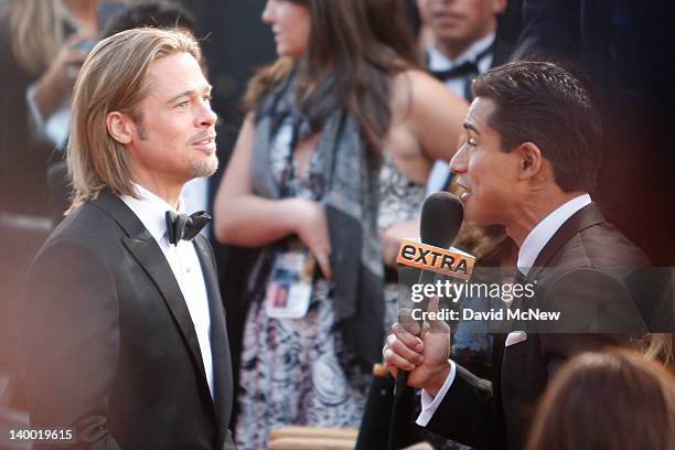 Actor Brad Pitt is interviewed by TV personality Mario Lopez on the red carpet at the 84th Annual Academy Awards held at the Hollywood & Highland...